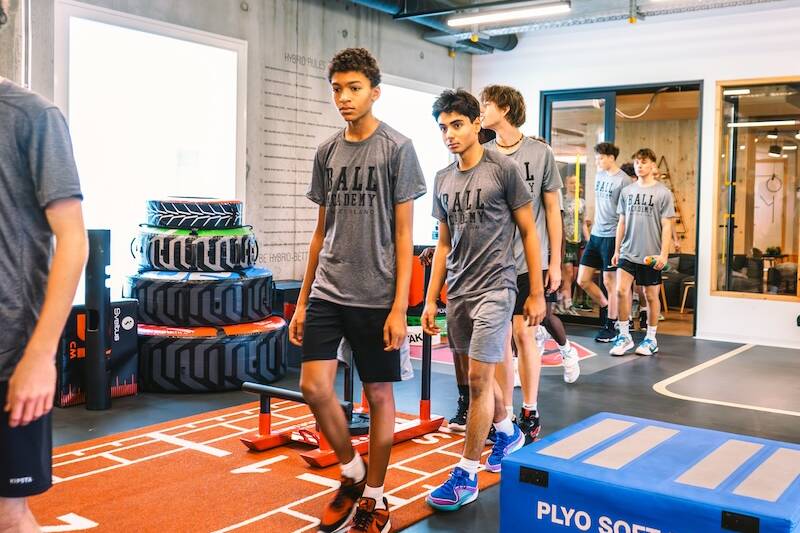 Ball Acadmey players entering the gym