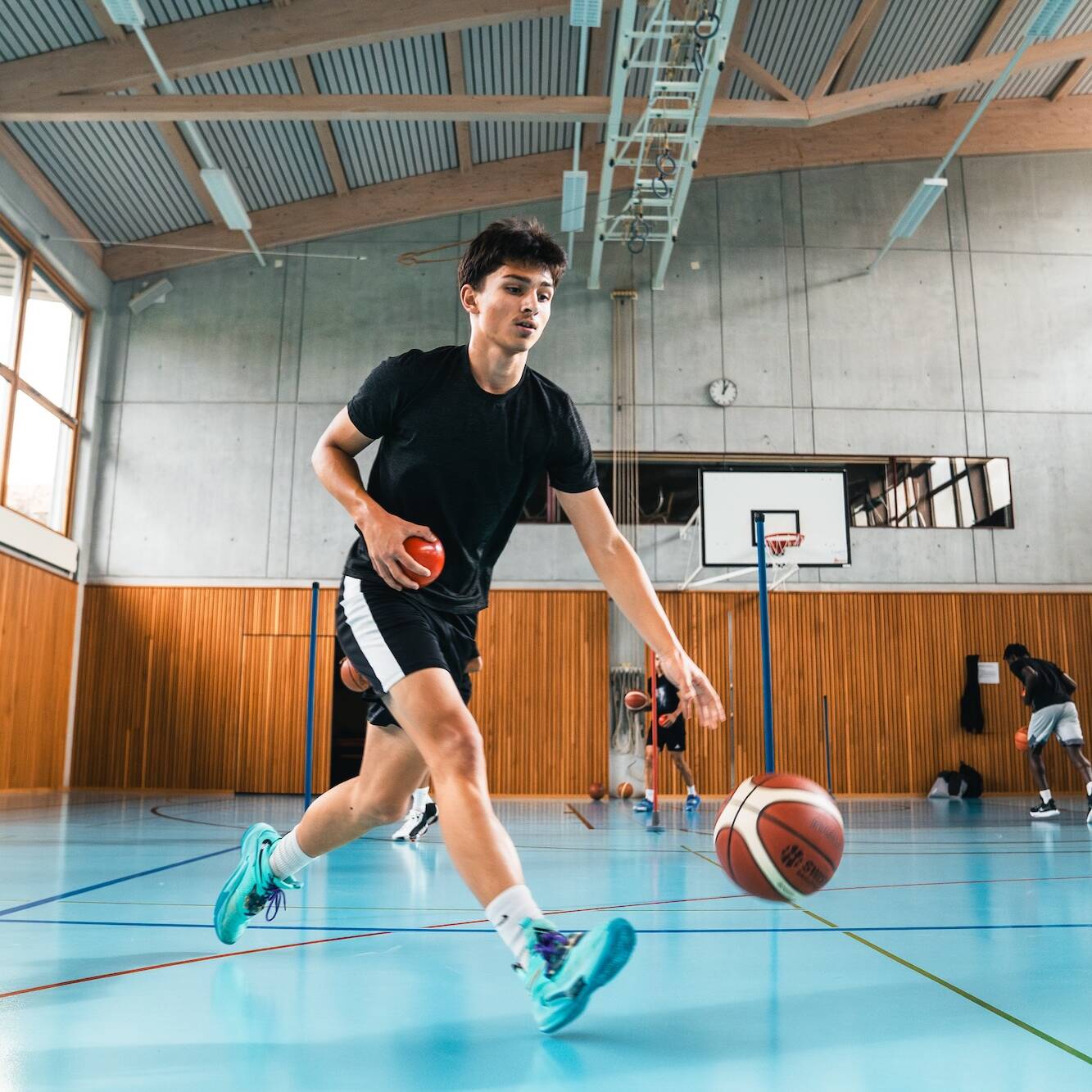 Young male player at a Ball Academy skills training in Genthod gym